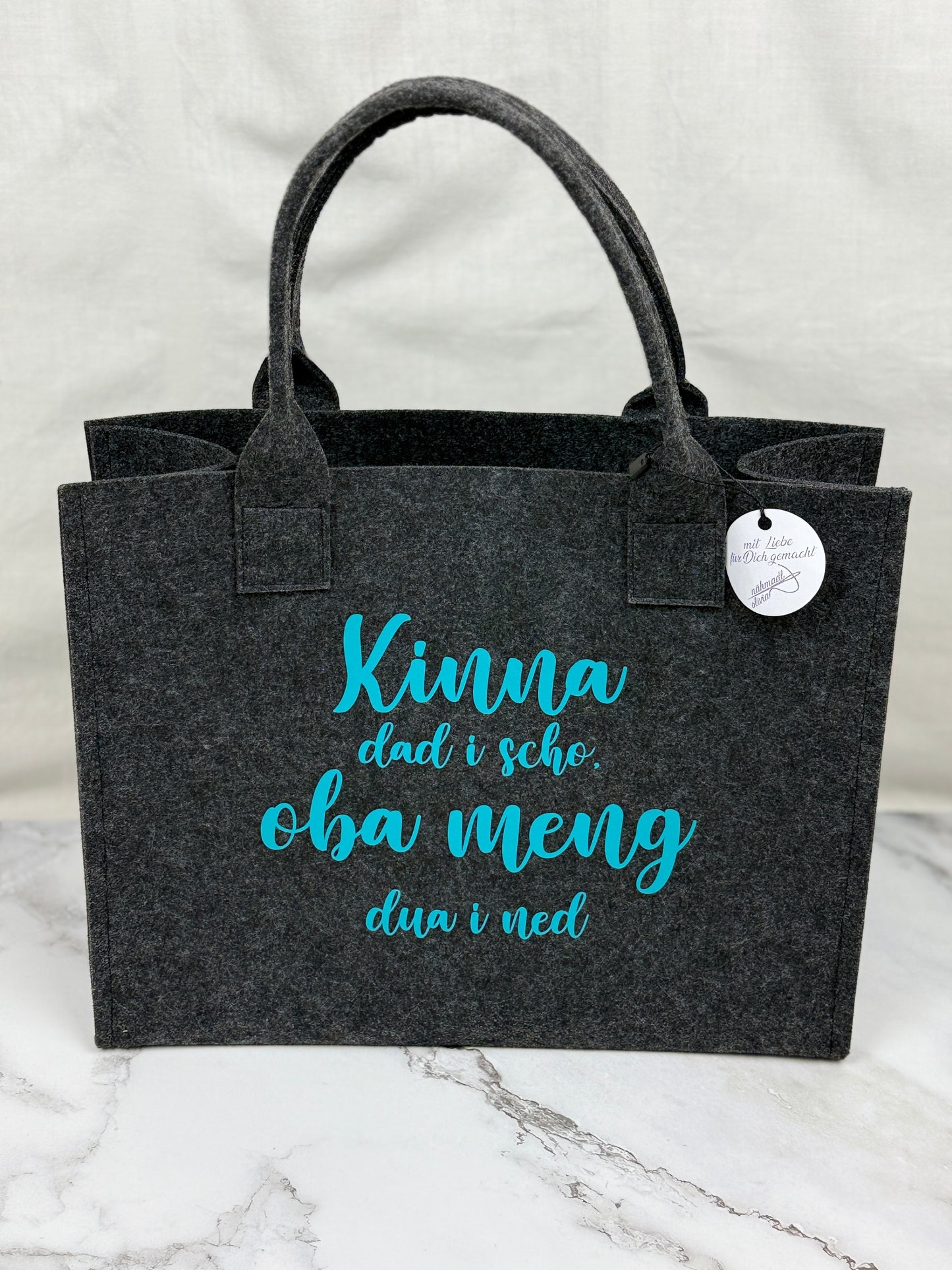 Handgefertigte Filztasche "Kinna dad i scho, oba meng dua i ned"