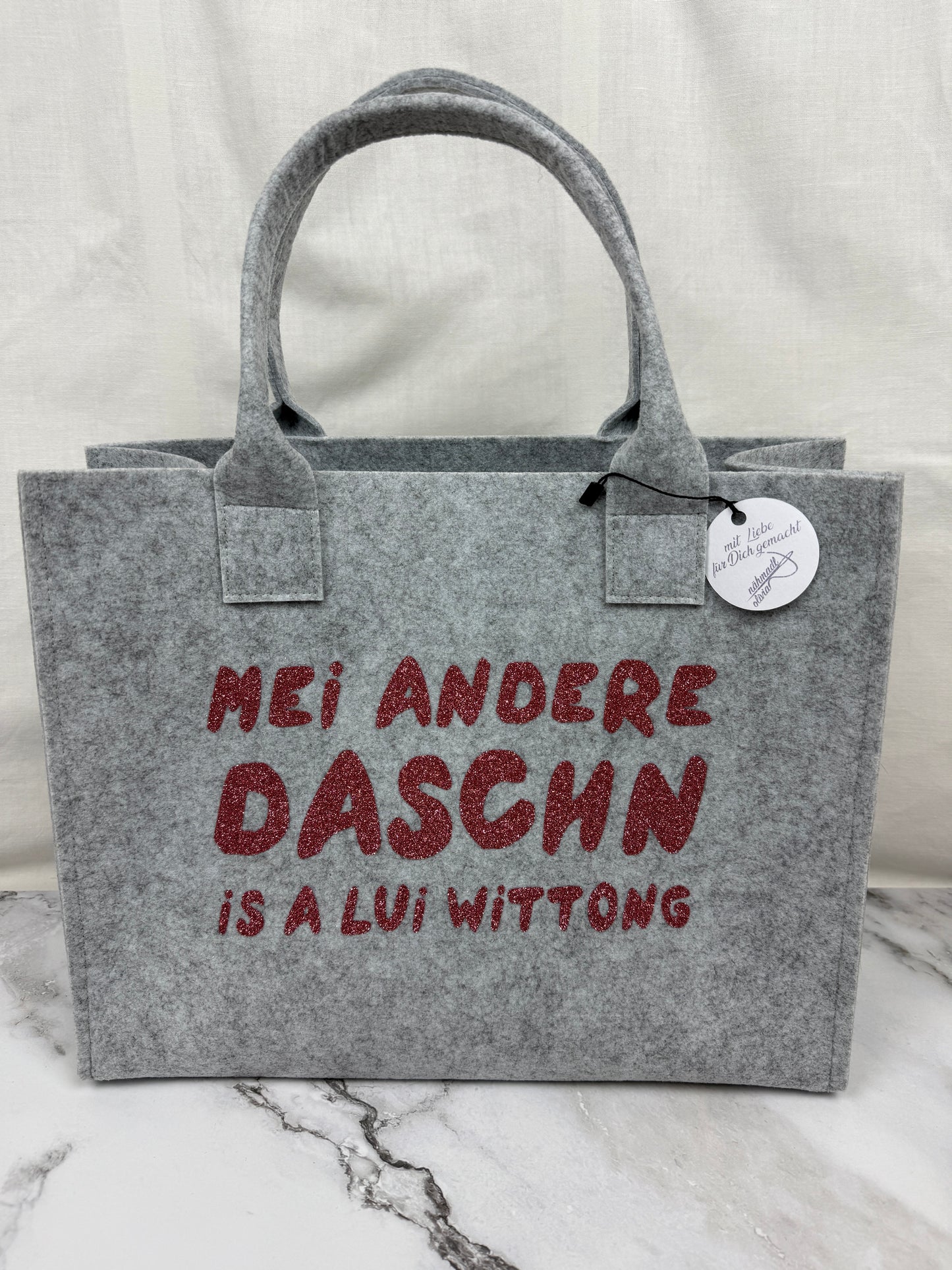 Handgefertigte Filztasche "Mei andere Taschen is a Lui Wittong"