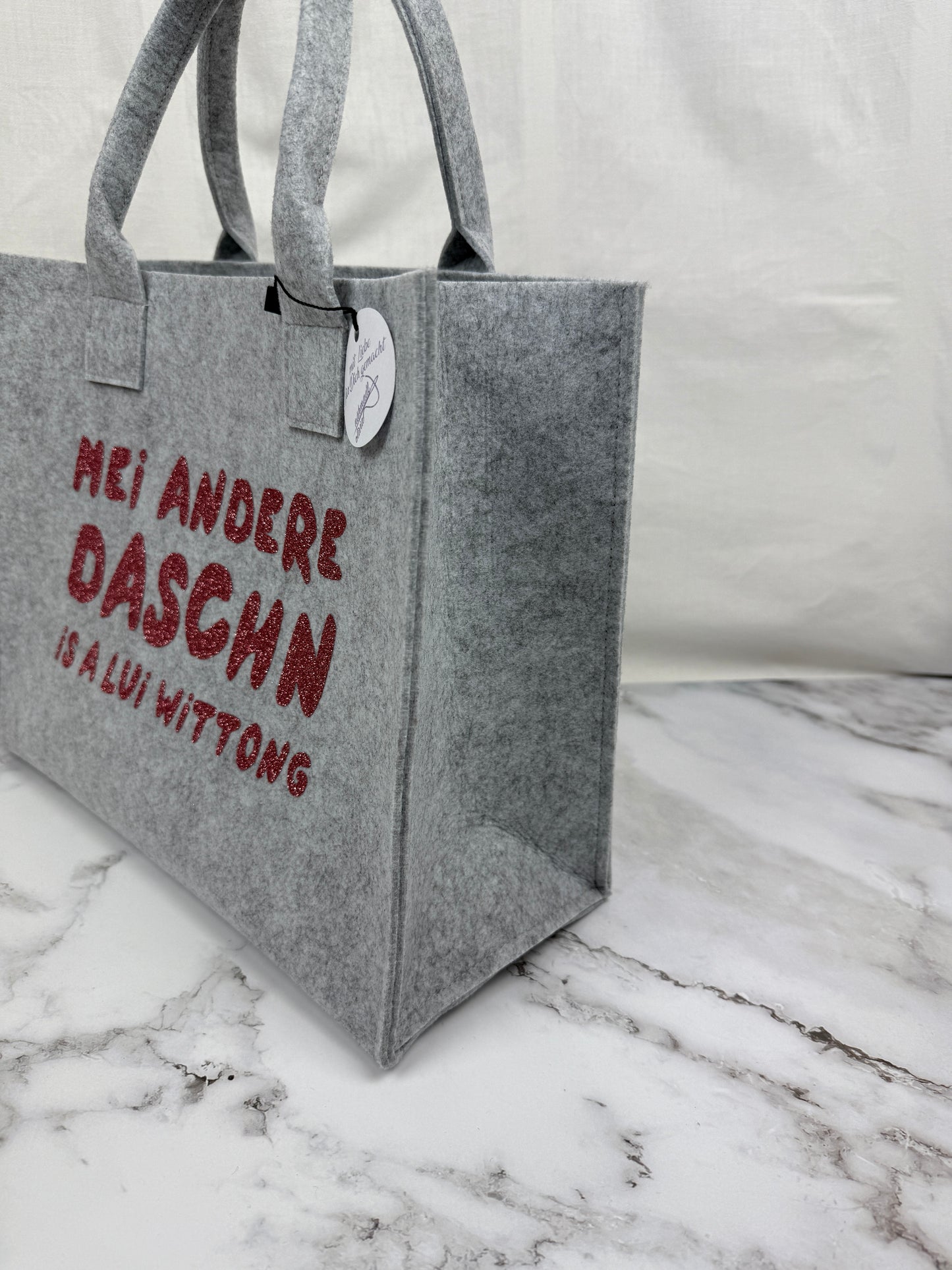 Handgefertigte Filztasche "Mei andere Taschen is a Lui Wittong"